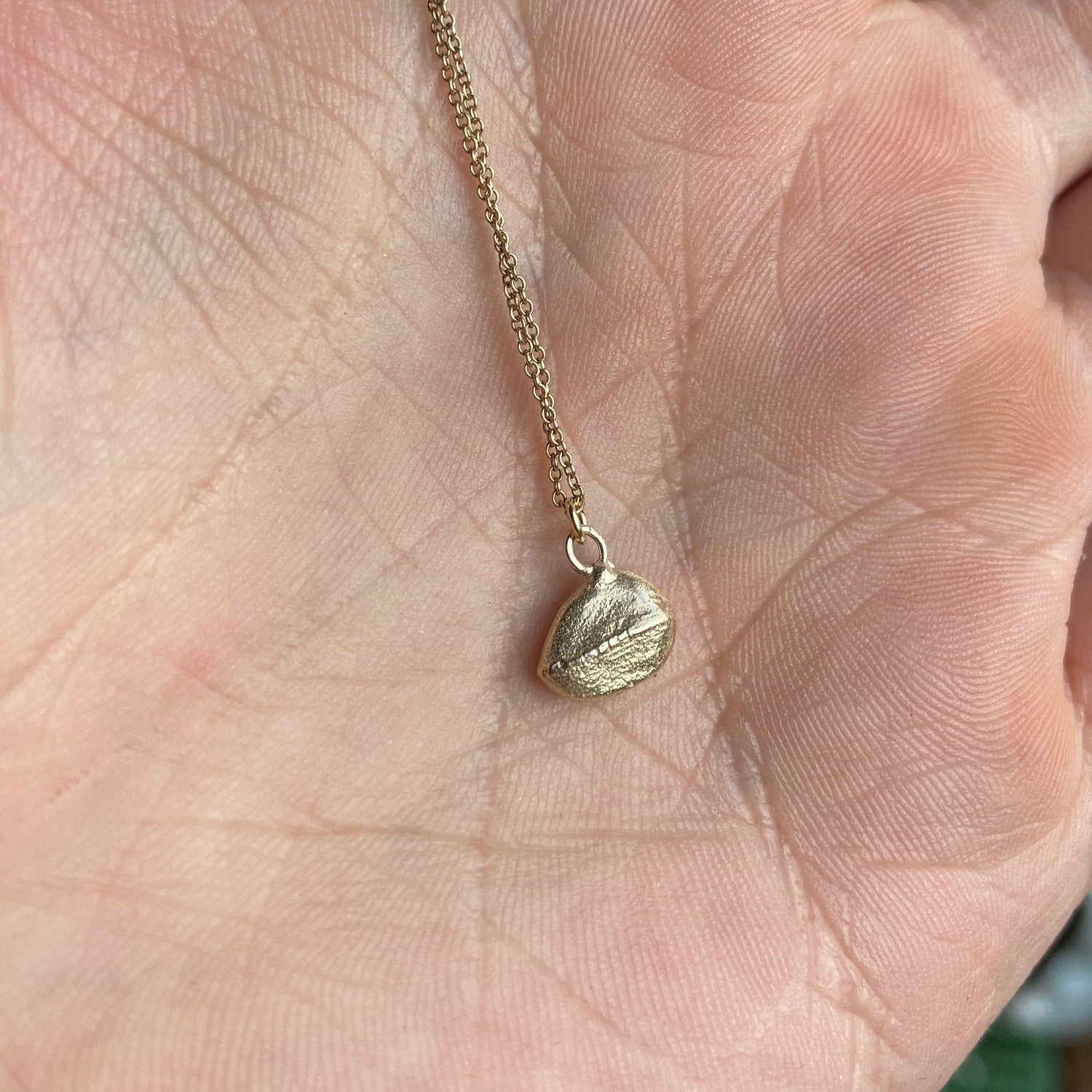 Solid Gold Lined Pebble Pendant