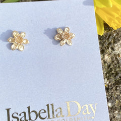 Tiny daffodil stud earrings in solid gold